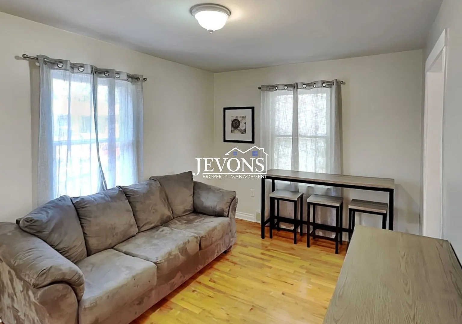 A 2-bedroom home with a 2-car garage plus driveway parking, and an in-unit washer and dryer — Photo 3