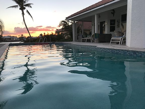 A huge swimming pool where you can swim and dive