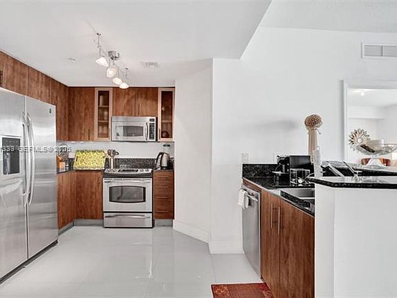 5th image of 7900 Harbor Island Dr APT 704