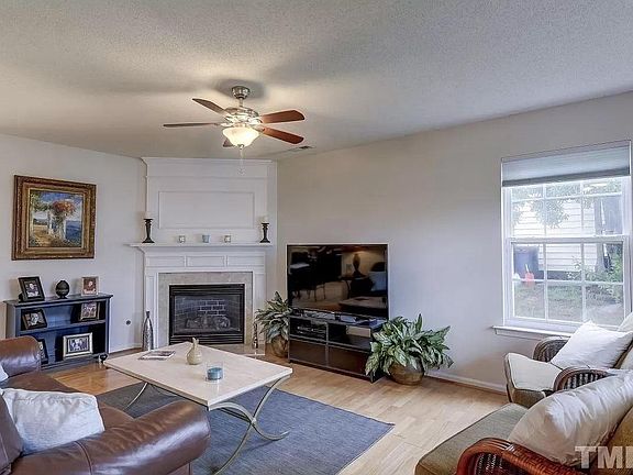 Family Room with Gas Log Fire Place.