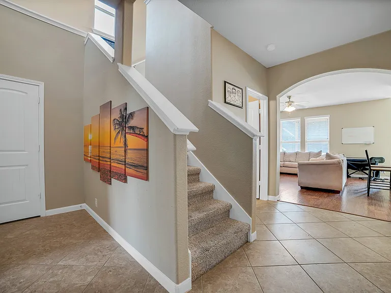 Inside front door, stair-view