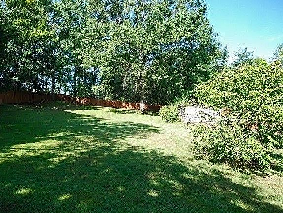Fenced back yard, shed