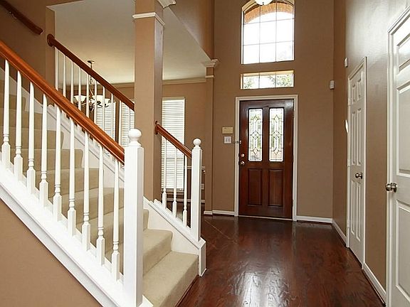 2 story entry with rich hardwood floors that extend through most of first floor.