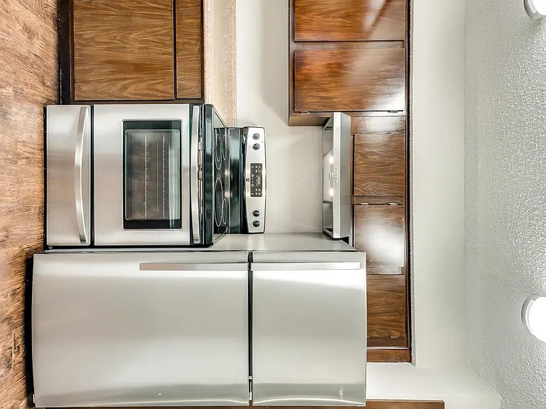 kitchen with entrance to a separate dining area 
plenty of cabinets for lots of storage