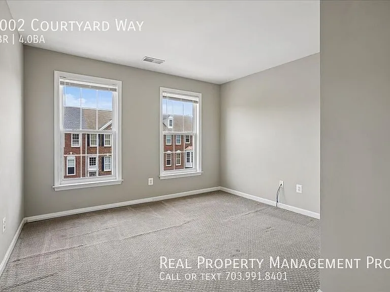 7002 Courtyard Way — Photo 26