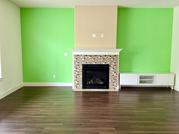 open living space (the lime green walls are painted gray color)