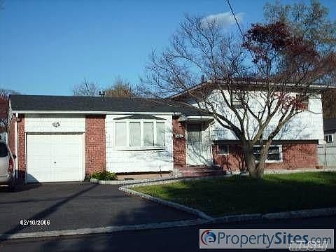 1st image of 213 W 23rd St