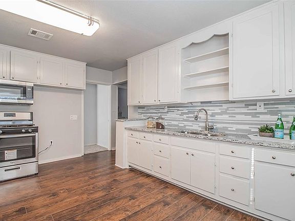 5th image of 8213 Downe Dr