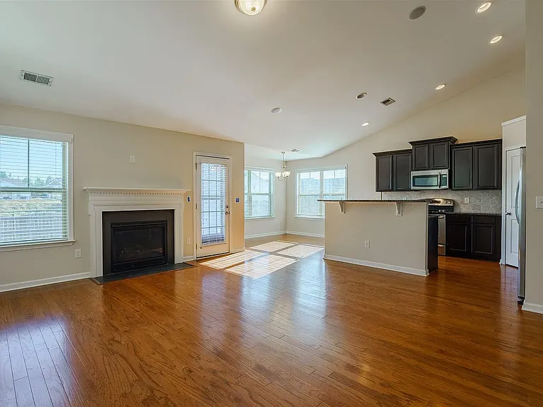 Gorgeous kitchen/family room with vaulted ceiling.
