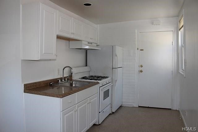 Updated kitchen with dining area.