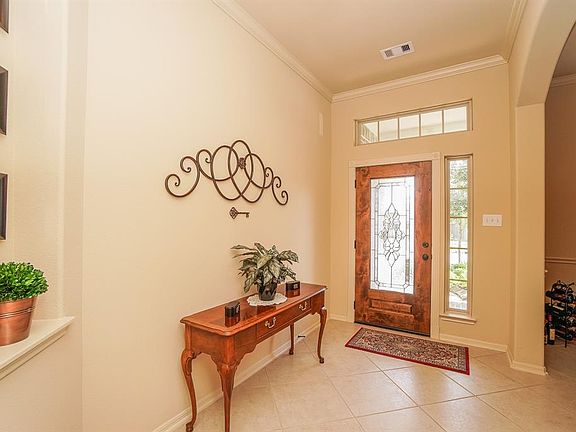 Tile floors welcome you into the home.