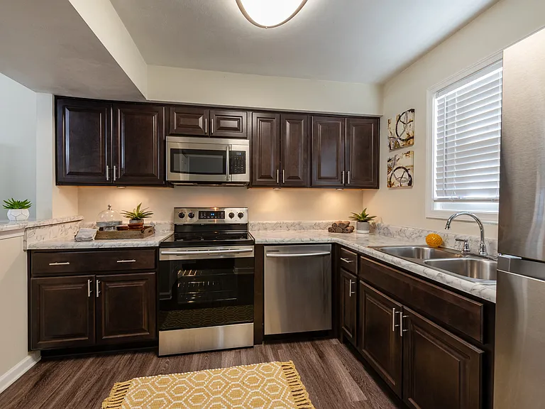 Spacious kitchen with stainless steel appliances.