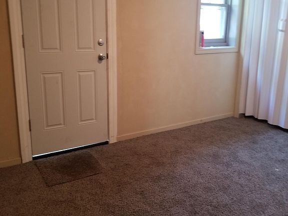 Small Bedroom-This room is small and will not fit a king bed. This room will fit a queen, however it will be really tight.