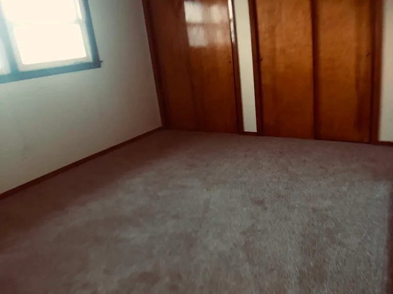 also has wall to wall closets