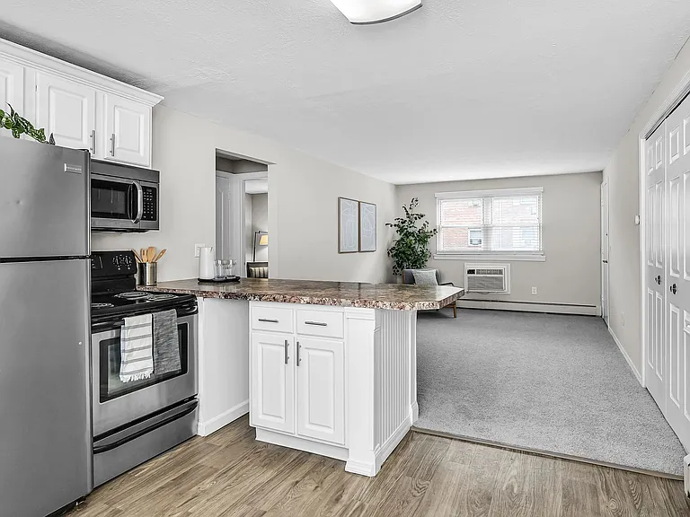 Embrace Elegance in Our Modern, Open-Concept Kitchens!