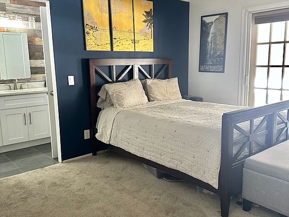 Primary bedroom + office area + access to backyard