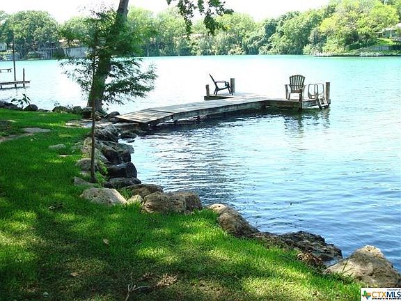 Stone retaining wall and dock