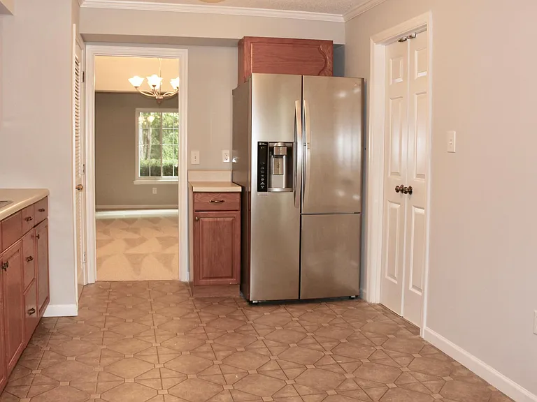 Kitchen with Stainless Steel Refrigerator