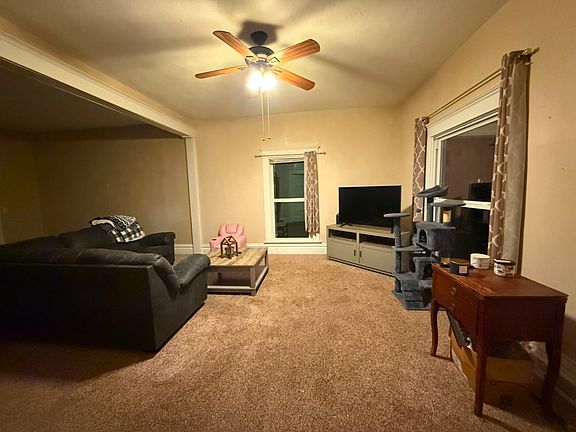 Living room from view of the master bedroom and front walk way