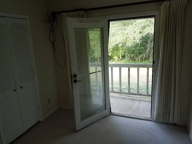 This is a view of the private side covered patio with faces the east morning sun.