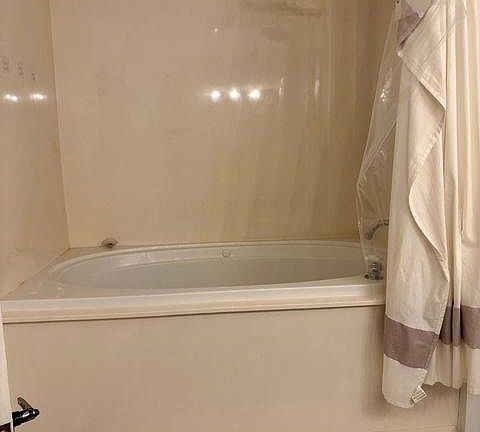 Deep tub in one bathroom