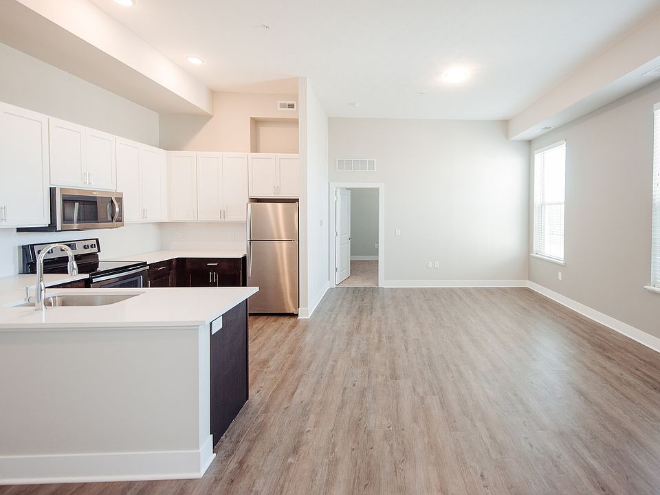Embrace modern living with this bright and spacious open-concept kitchen and living area.