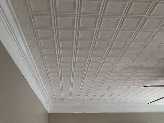 Tin ceiling in dining room
