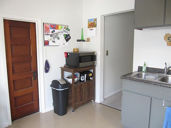 Door to storage off kitchen.