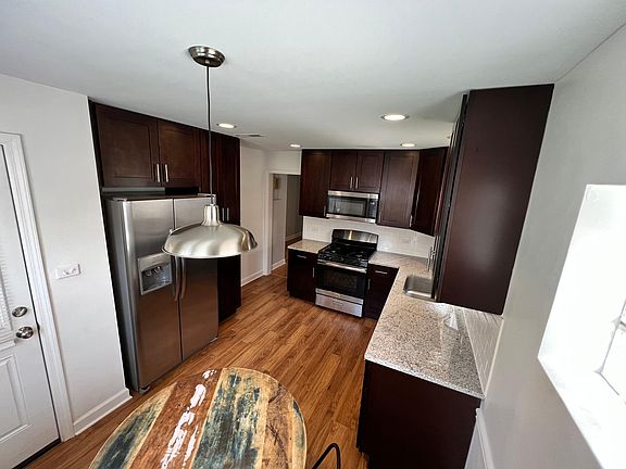 Large kitchen with lots of cabinets and countertop space!