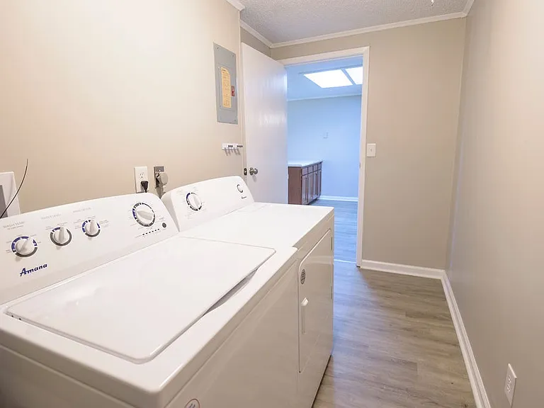 Laundry room with full-sized washer and dryer