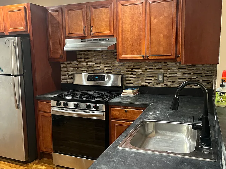 Updated kitchen open to see and engage as you are making dinner! Breakfast bar on the other side can fit 2-3 bar stools for additional eating space.