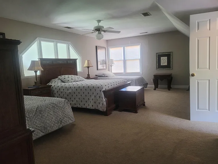 Loft sleeping....queen bed and 2 single beds. New luxury vinyl tile not pictured.