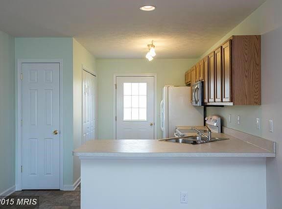 Dining Area Looking to Kitchen