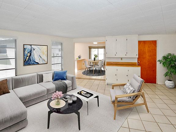 TWO LIVING AREAS IN THIS HOME. ONE IN THE FRONT OF THE HOUSE, ONE IN THE REAR.