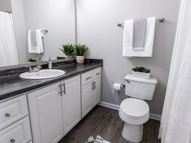 Pamper yourself with the master bathroom's oversized vanity and mirror.