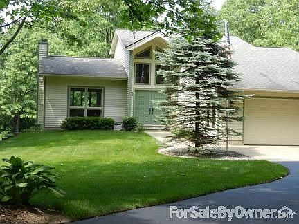 New paint : Cedar siding blends with the natural surroundings.