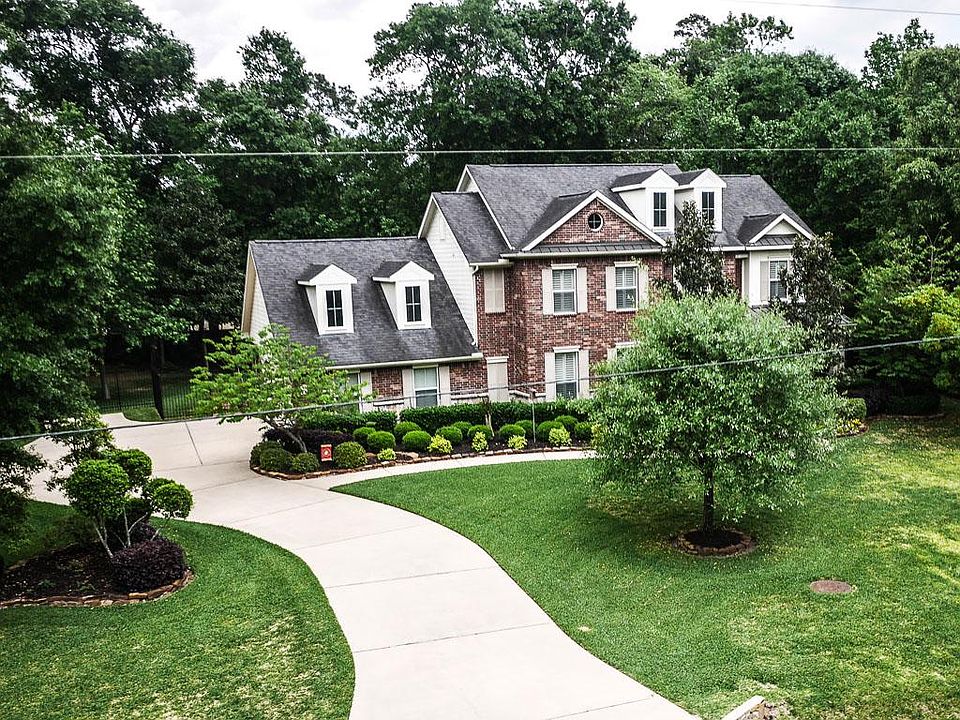 13260 Brookfield Lane sits on a 31,936 sq.ft. wooded lot.
