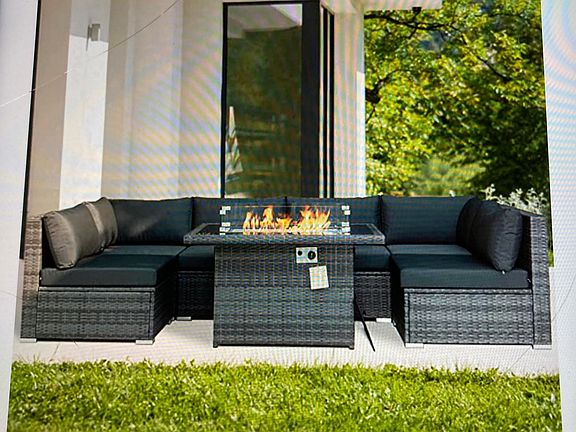 Cozy backyard furniture with propane firepit