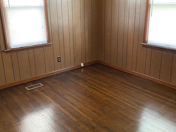 Bedroom with refinished floor