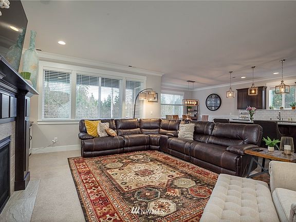 Open concept living room/dining room/kitchen