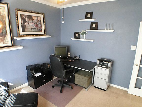 Home office located at the front of the home with plenty of space.