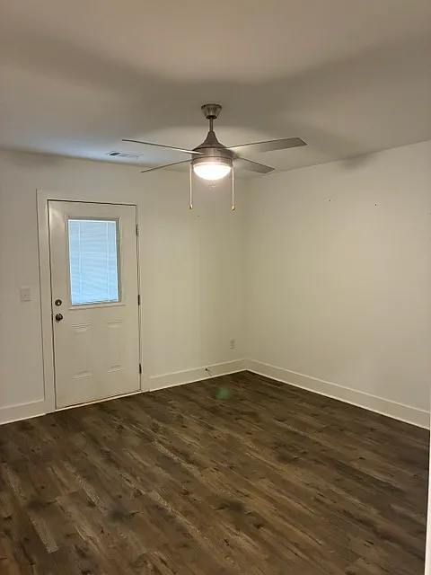 primary bedroom with back door entry