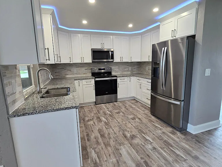 Tons of cabinet space and fun LED lighting.