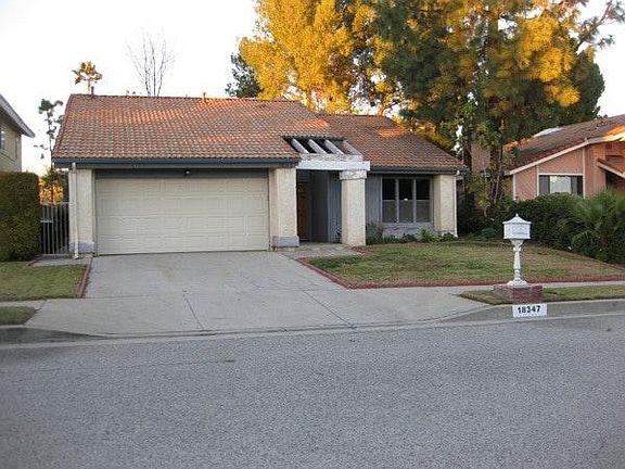 Front view of the house with two car garage