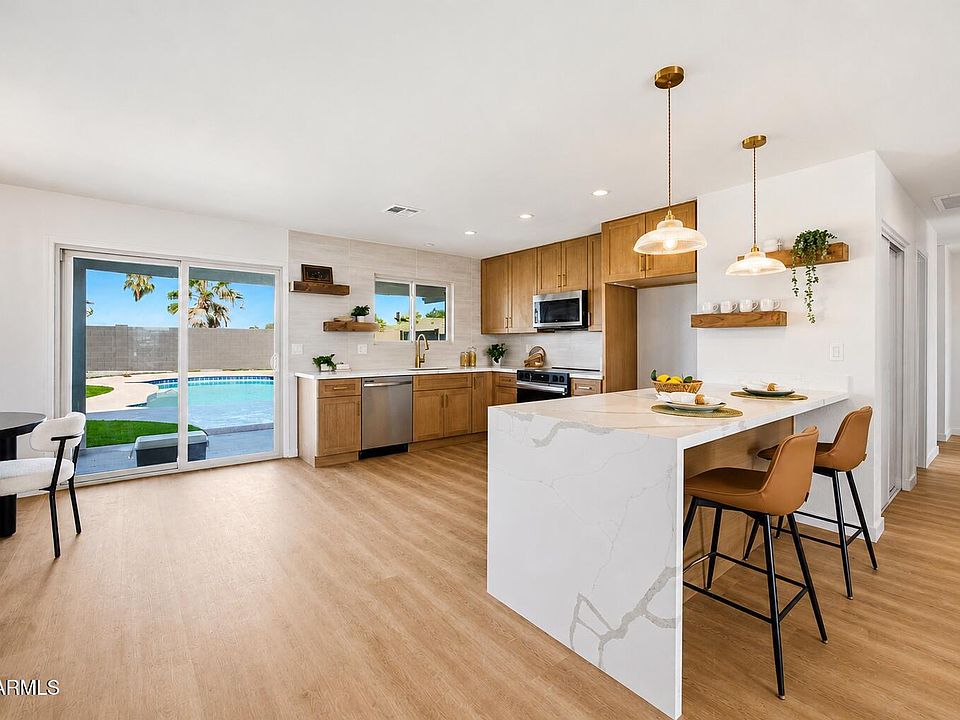 1st image of 619 N SUN MEADOWS Avenue