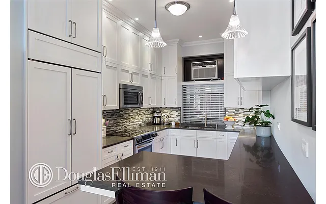 Sold by Douglas Elliman | media 20