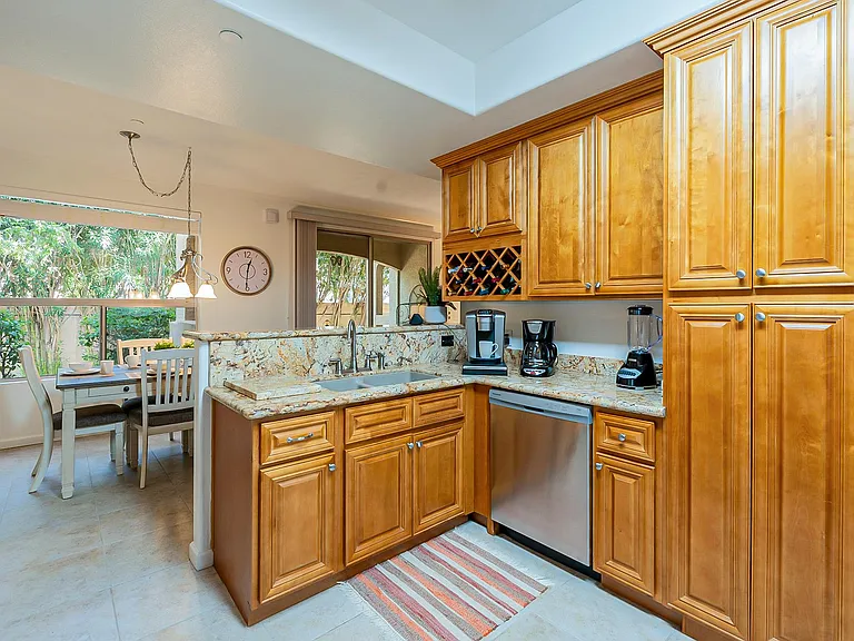 Dining area open to kitchen. Keurig and Drip Coffee Maker