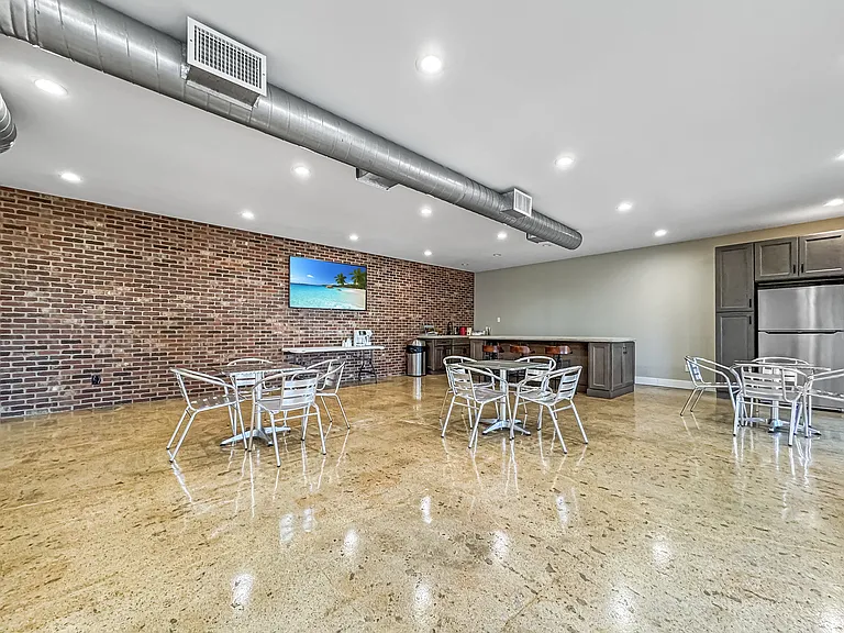 A stylish community clubhouse perfect for work, study, or social gatherings.