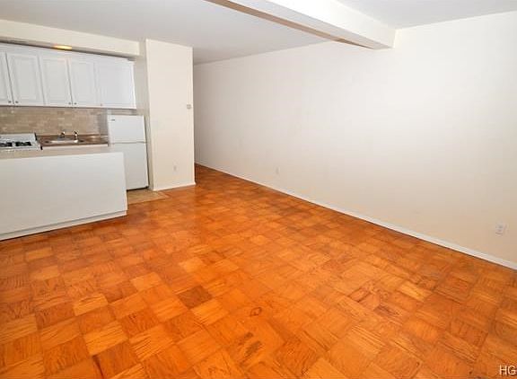 Large living room can easily be divided to many different configurations allowing for a living, slee