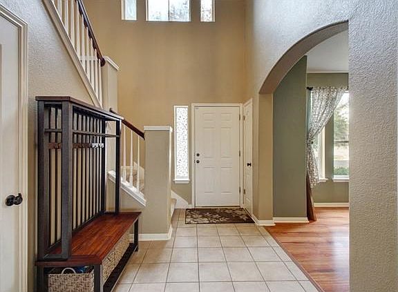 The entry has that touch of class that will make you proud to welcome friends and family to your home.